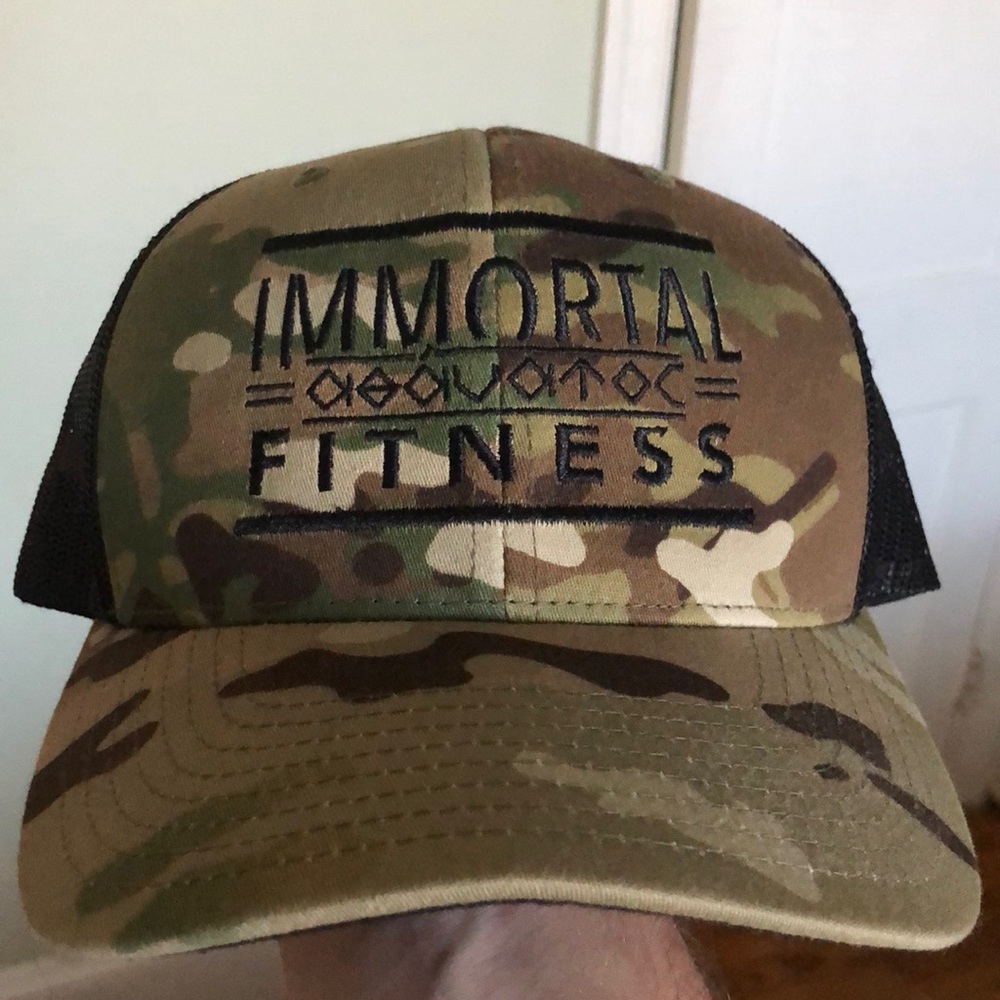 Immortal fitness multi cam military trucker ball cap.